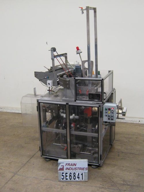 PDC Intl照片。公司Labeler Sleever ETIRA STAR 1-5