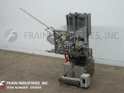 羽毛饲养者优惠券插入器34-Boam-IB的照片