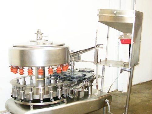 图片的联邦填料液体重力/压机G185 18头旋转填料