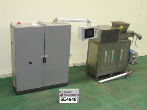 图片的拉丁尼糖果挤出机执行