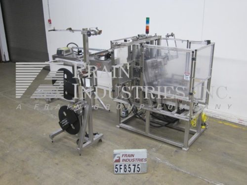 PDC Intl照片。公司Labeler Sleever R600