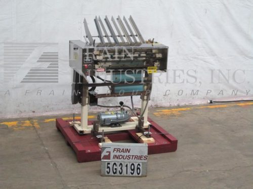 MGS饲养者优惠券Inserter RPP424D的照片