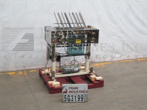 MGS饲养者优惠券Inserter RPP424D的照片