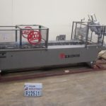 Adco Cartoner Semi horizon的缩略图。胶水(Semi) 15D Adco半自动水平卷盒机，速度可达每分钟120箱。